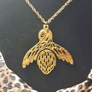 Vintage Goldtone hinged bird on 23" chain